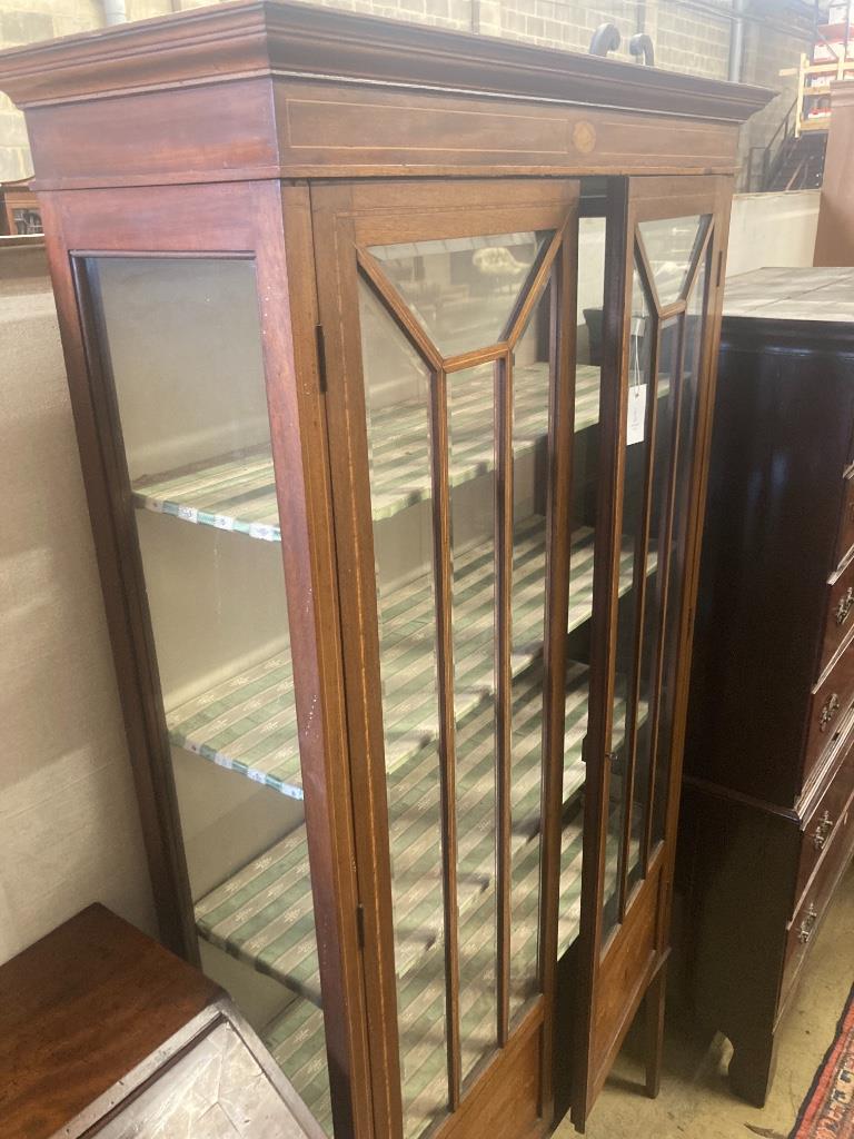 An Edwardian inlaid mahogany display cabinet, width 100cm, depth 33cm, height 194cm